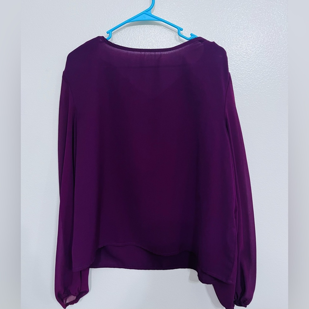 Long sleeved maroon blouse